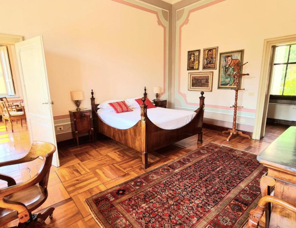 Postel nebo postele na pokoji v ubytování Castello di Lispida