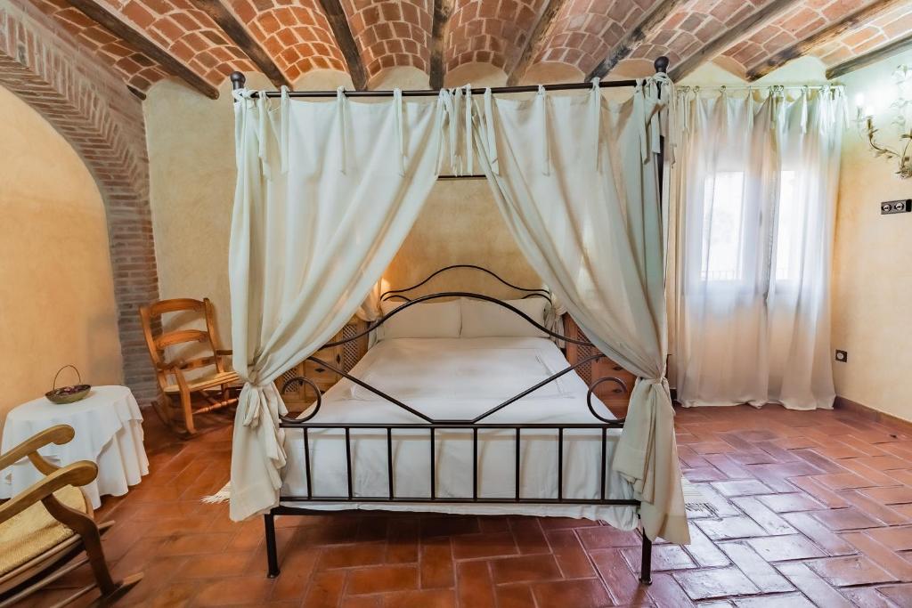 Posteľ alebo postele v izbe v ubytovaní Hotel Rural La Sinforosa