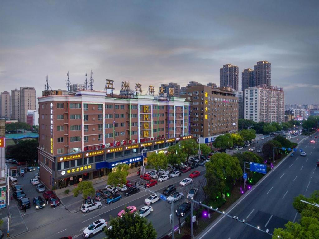 an aerial view of a building in a city at Starway Hotel Wenzhou Rui'an Tangxia in Xianjiayu