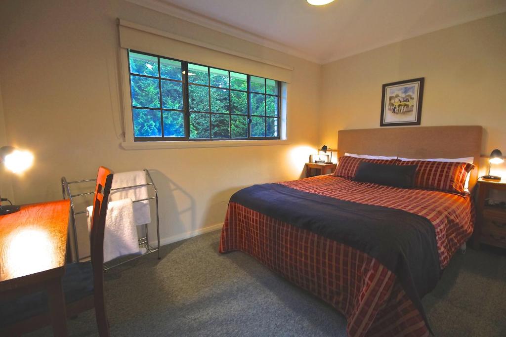 Postel nebo postele na pokoji v ubytování Port Arthur Villas