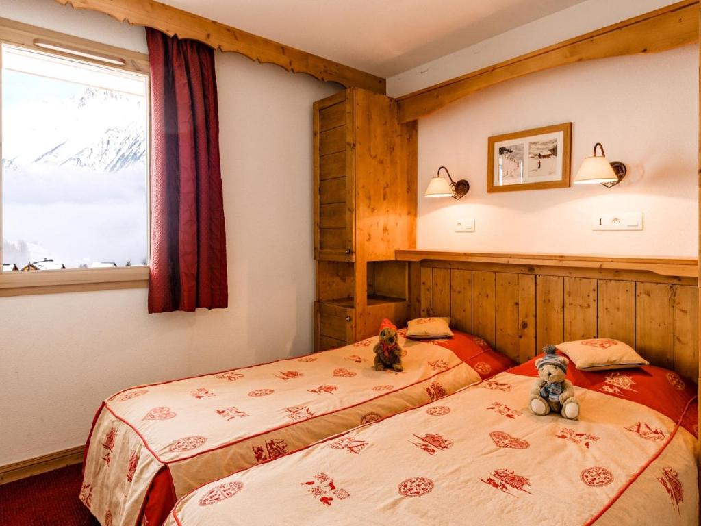 En eller flere senge i et værelse på Family Apartment near Ski