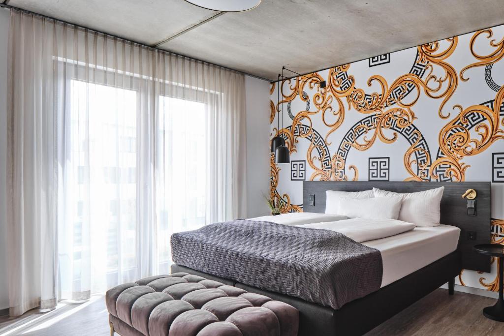 Postel nebo postele na pokoji v ubytování Hotel BalthazarS