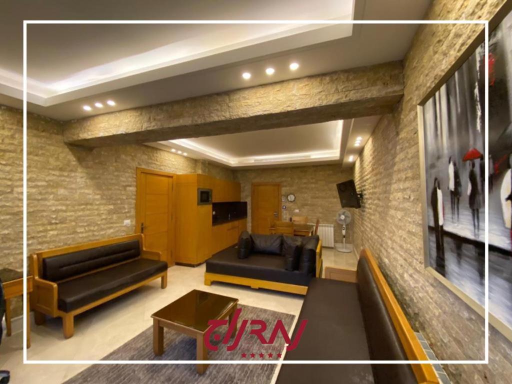 Posezení v ubytování Raj Hotel
