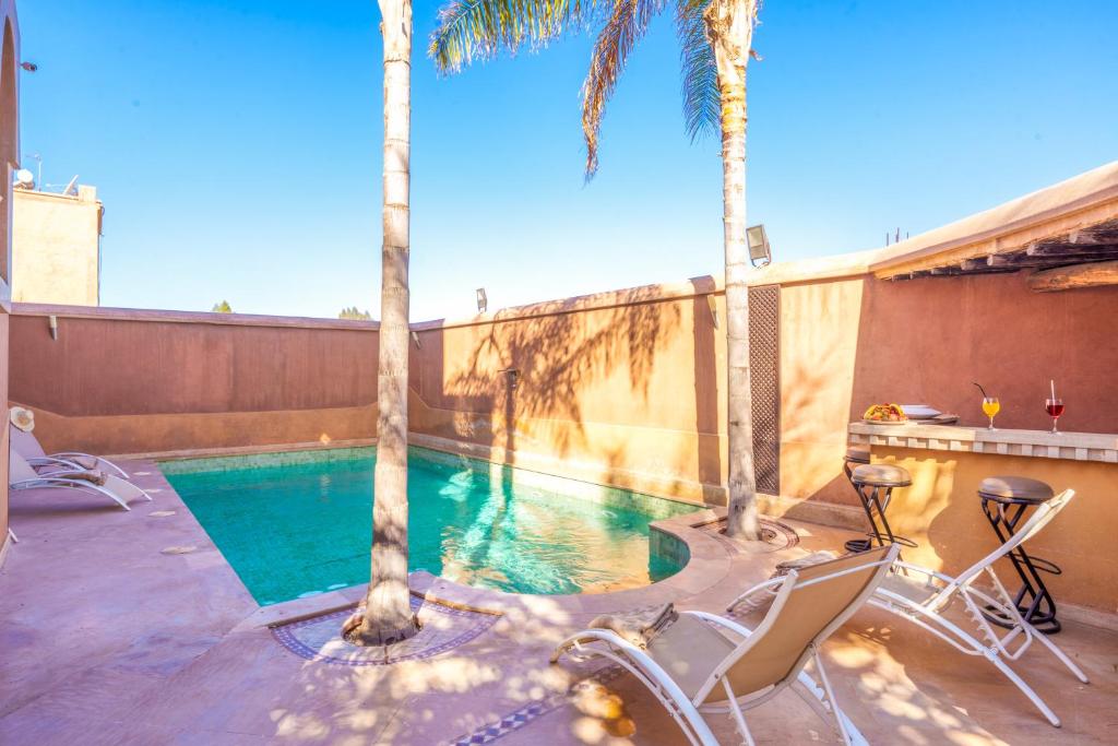 Bazén v ubytování Riad Ushuaia La Villa - Centre Marrakech nebo v jeho okolí