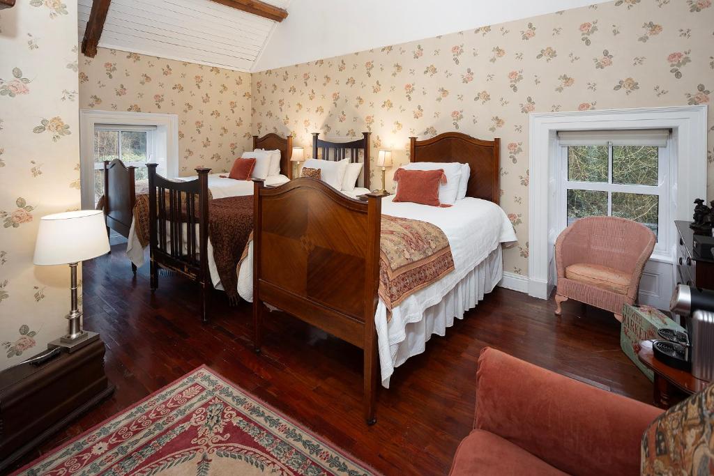Postel nebo postele na pokoji v ubytování Barnabrow Country House