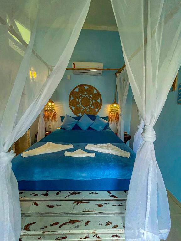 Postel nebo postele na pokoji v ubytování ASAS DEL MAR - SUITES