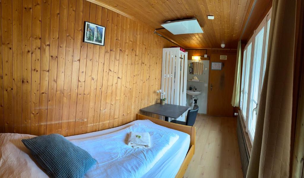 Postel nebo postele na pokoji v ubytování Hotel Hornerpub