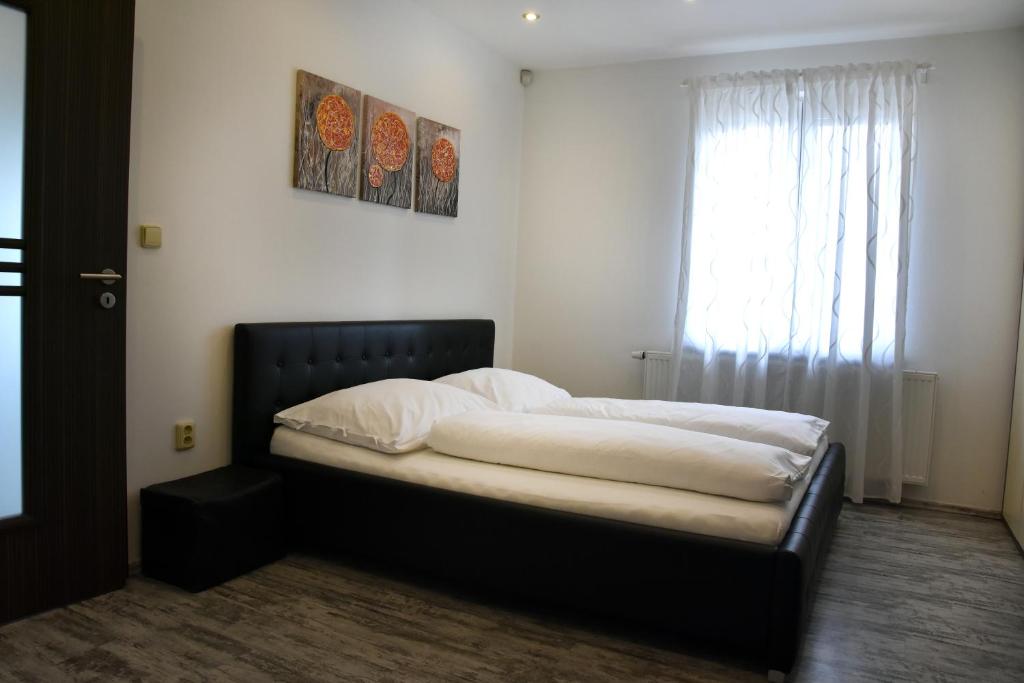 Postel nebo postele na pokoji v ubytování Apartmán Hrušky