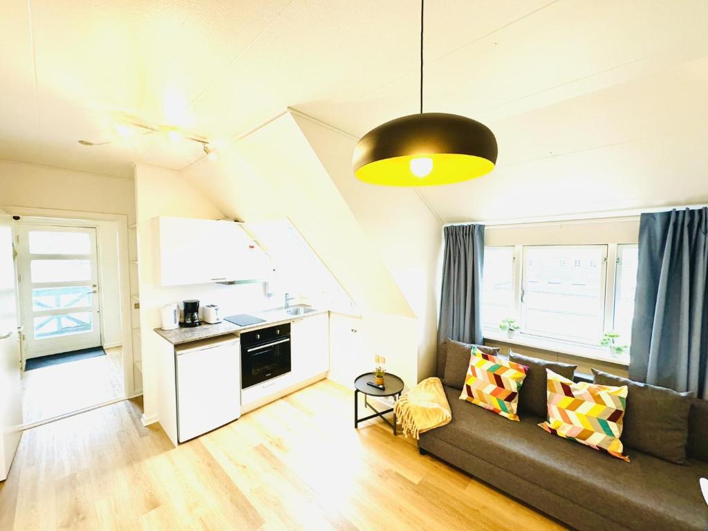Kuchyň nebo kuchyňský kout v ubytování aday - Stylish Central Apartment in Hjorring
