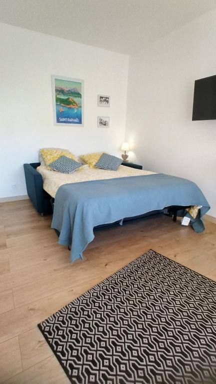 Voodi või voodid majutusasutuse Studio Tout à Pied - Vue Sur Mer toas