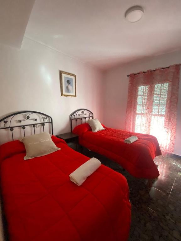 Łóżko lub łóżka w pokoju w obiekcie Casa Rural Balcones de Setenil