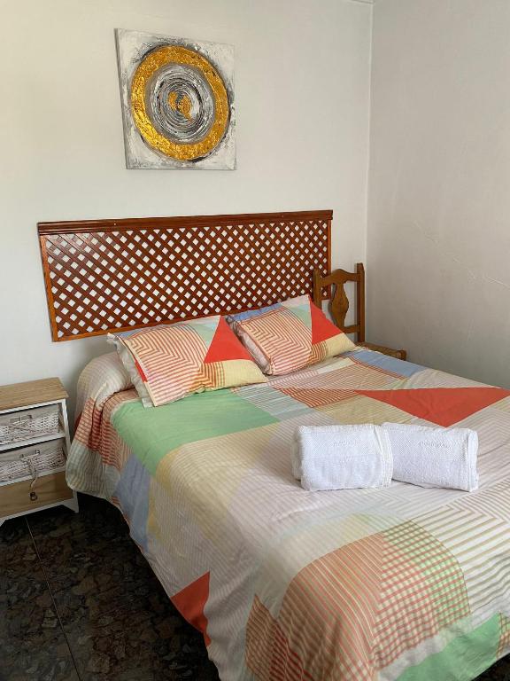Łóżko lub łóżka w pokoju w obiekcie Casa Rural Balcones de Setenil