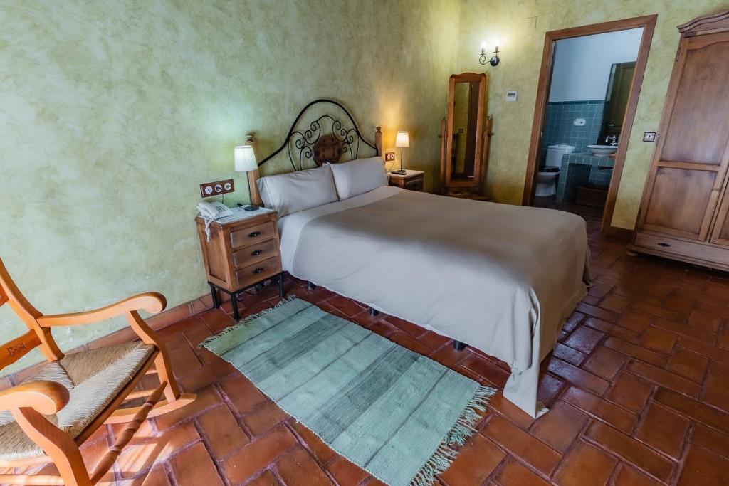 Posteľ alebo postele v izbe v ubytovaní Hotel Rural La Sinforosa