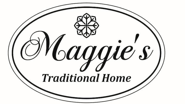 a black and white logo for a traditional home at Maggie's Traditional home in Pylos