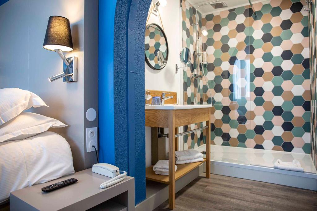 Postel nebo postele na pokoji v ubytování Hotel Port Marine