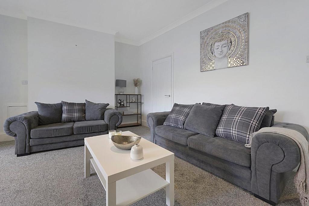 a living room with two couches and a table at Modern Apartment Near Blyth Coast Sleeps 5 in Blythe