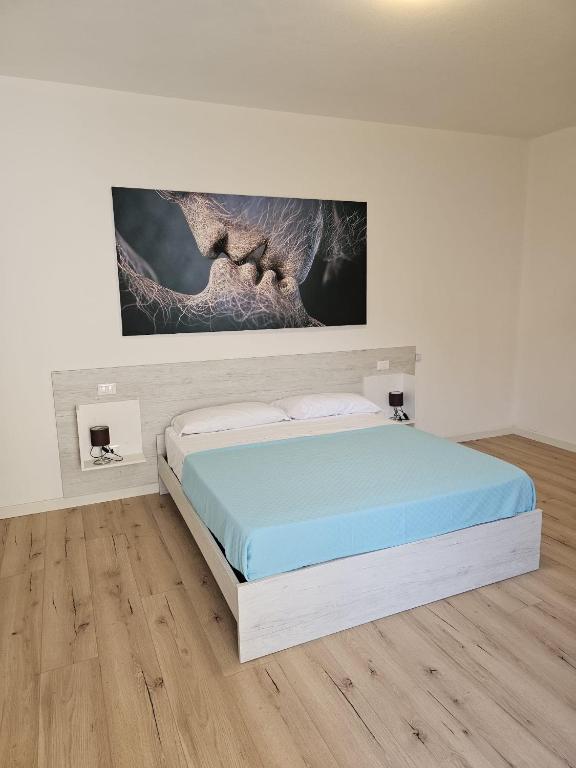 Postel nebo postele na pokoji v ubytování Via San Zeno Home