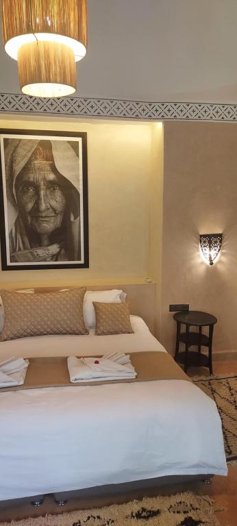 Postel nebo postele na pokoji v ubytování riad sbai palace