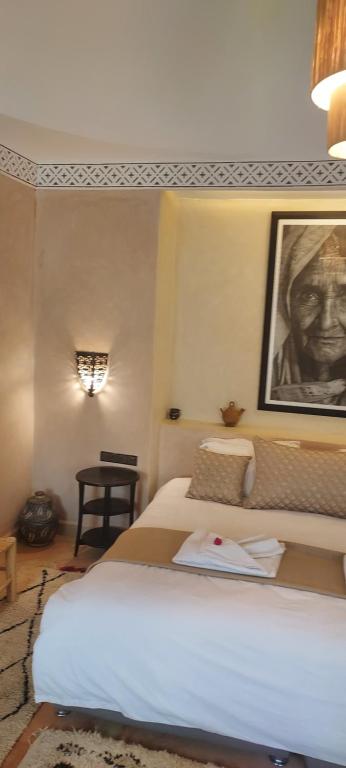 Postel nebo postele na pokoji v ubytování riad sbai palace