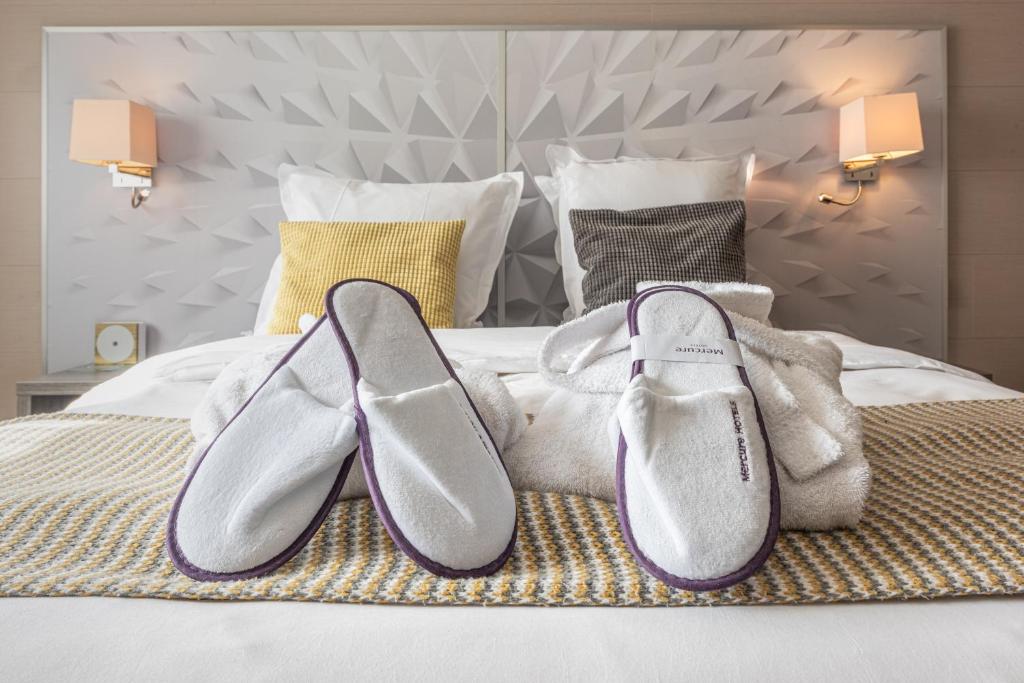 Postel nebo postele na pokoji v ubytování Mercure Annecy Sud