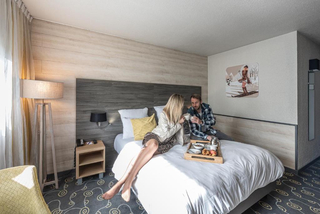 Postel nebo postele na pokoji v ubytování Mercure Annecy Sud