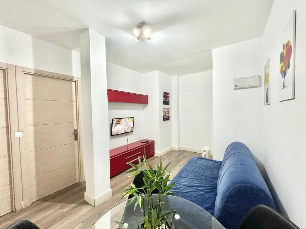 A television and/or entertainment centre at Madrid Rio Antonio Lopez A