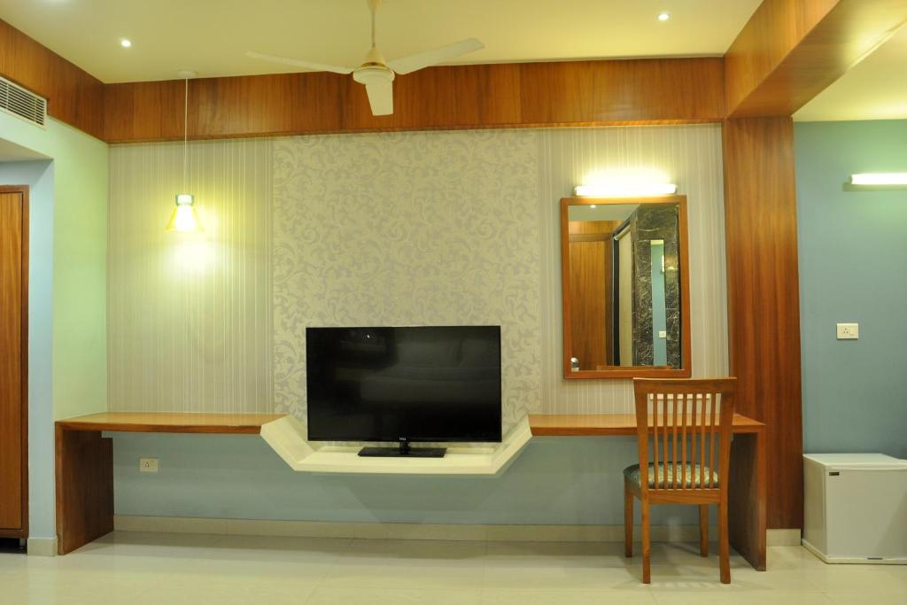TV a/nebo společenská místnost v ubytování Panaji Residency
