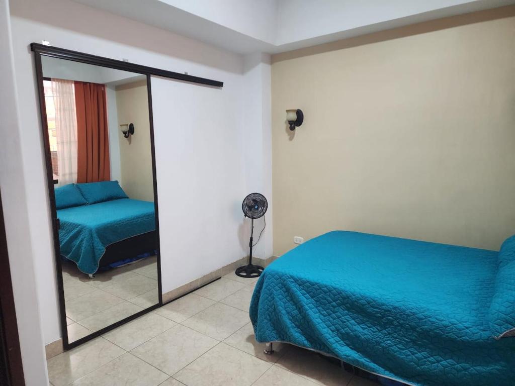 Cama ou camas em um quarto em Fantastico apto completo en el centro de Pereira