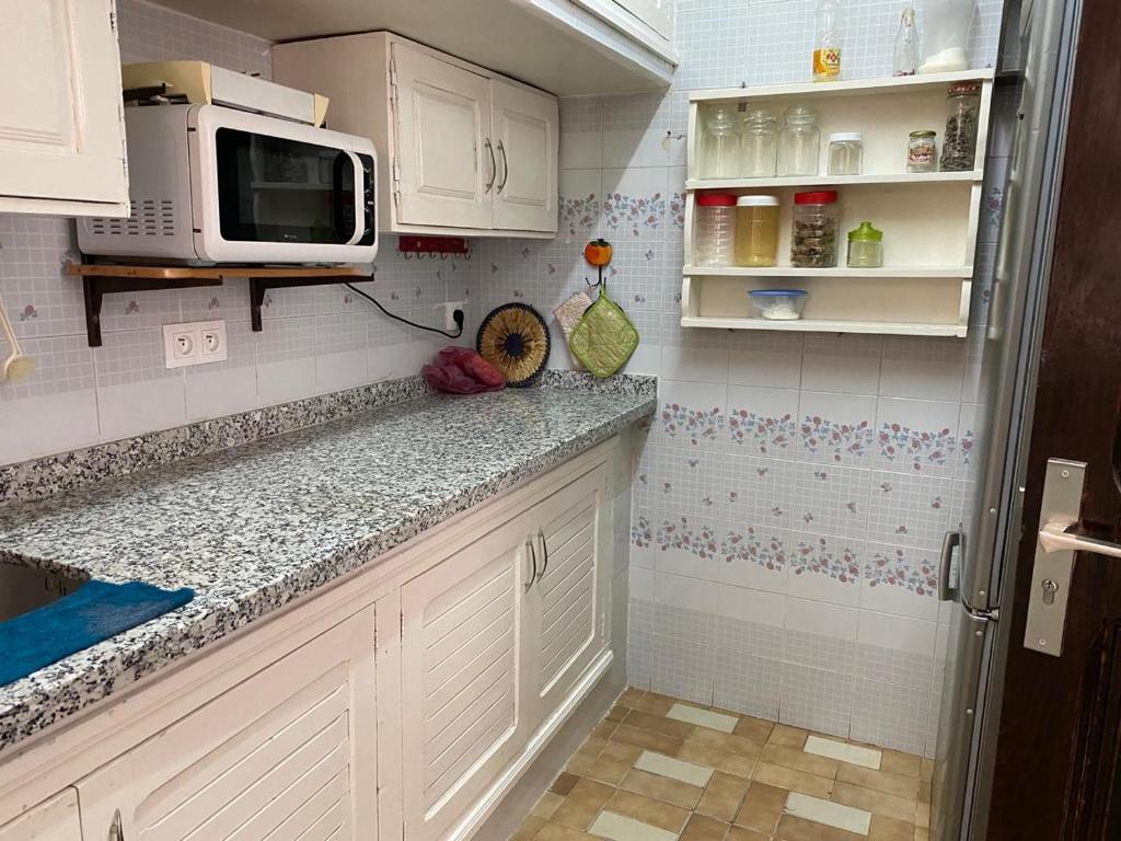 Kuchyň nebo kuchyňský kout v ubytování La esquina