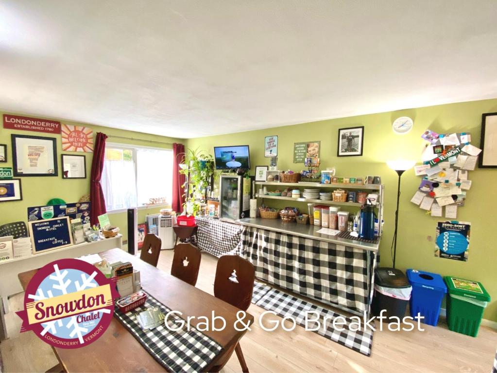 Kuchyň nebo kuchyňský kout v ubytování Snowdon Chalet Motel