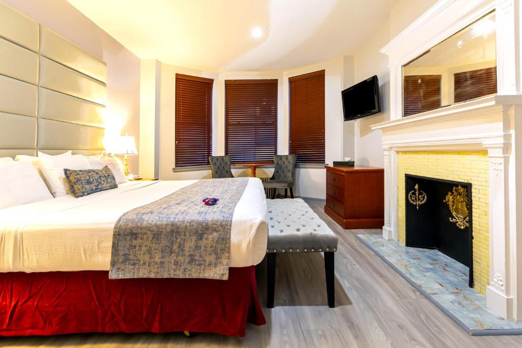 Postel nebo postele na pokoji v ubytování Hotel St. James