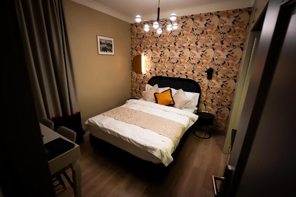 Postel nebo postele na pokoji v ubytování Tempus