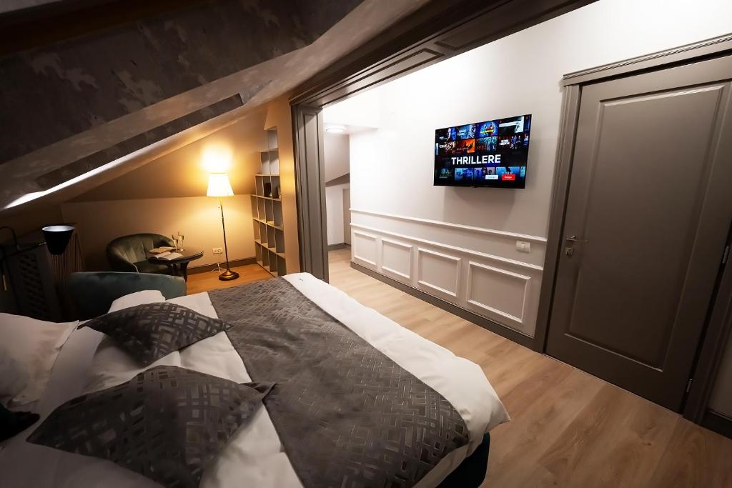Postel nebo postele na pokoji v ubytování Tempus