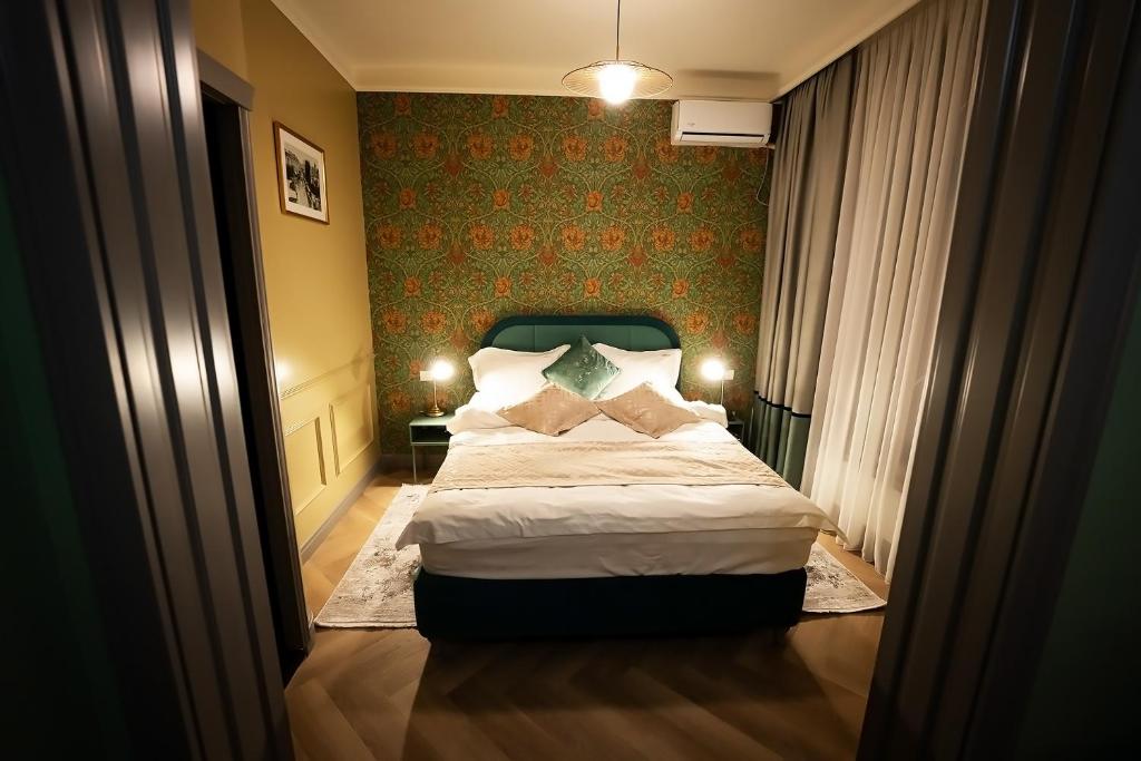Postel nebo postele na pokoji v ubytování Tempus