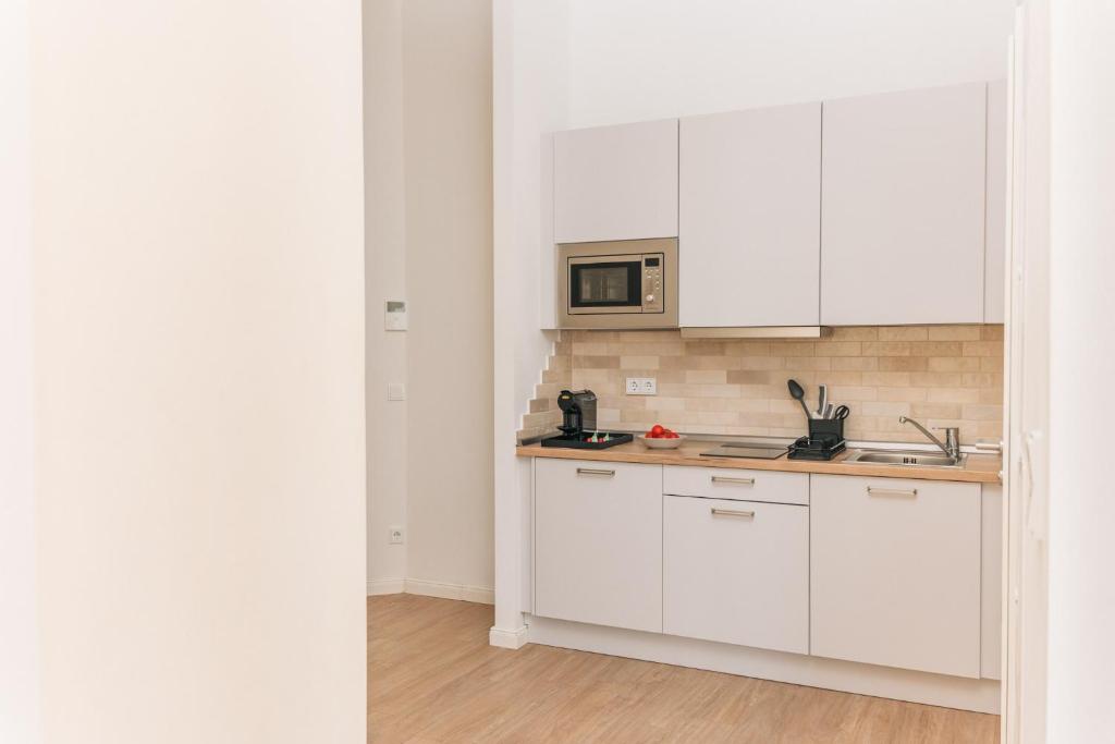 Homaris Apartments Frankfurter Allee - Resim 36