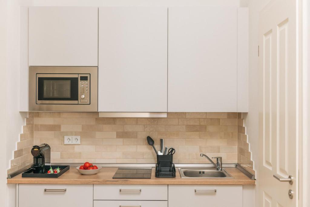 Homaris Apartments Frankfurter Allee - Resim 21