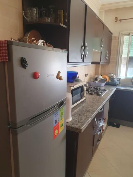 Kuchyň nebo kuchyňský kout v ubytování Appartement spacieux, exceptionnel