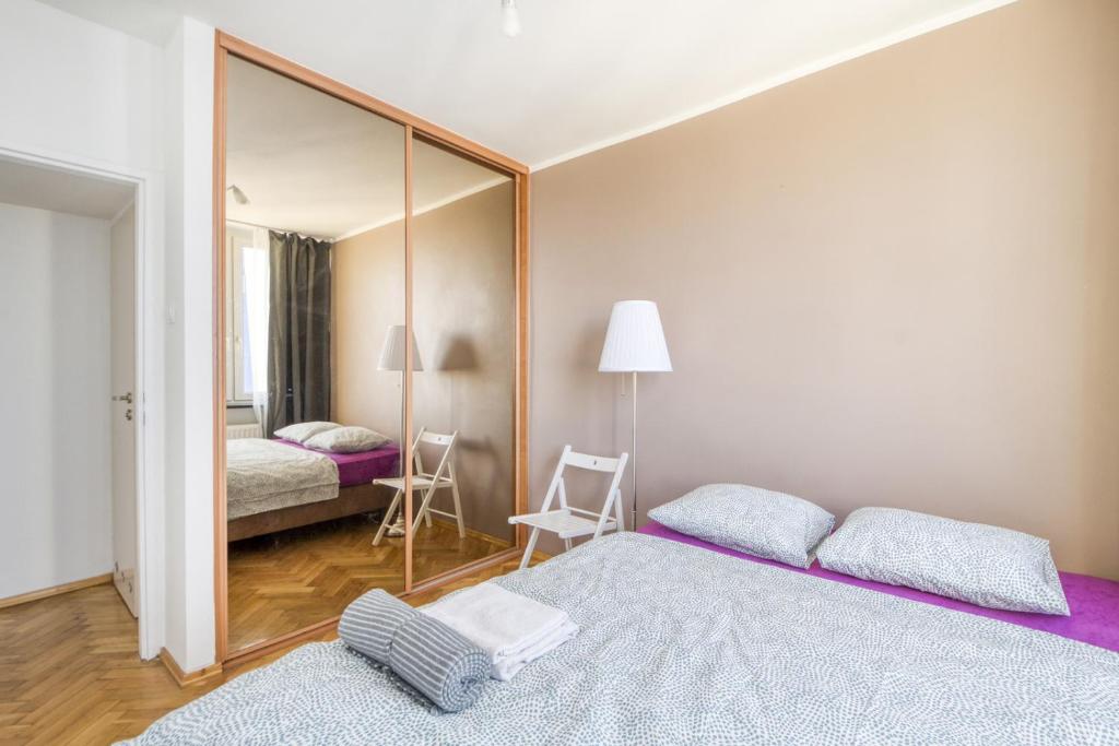 Posteľ alebo postele v izbe v ubytovaní Pańska Residence