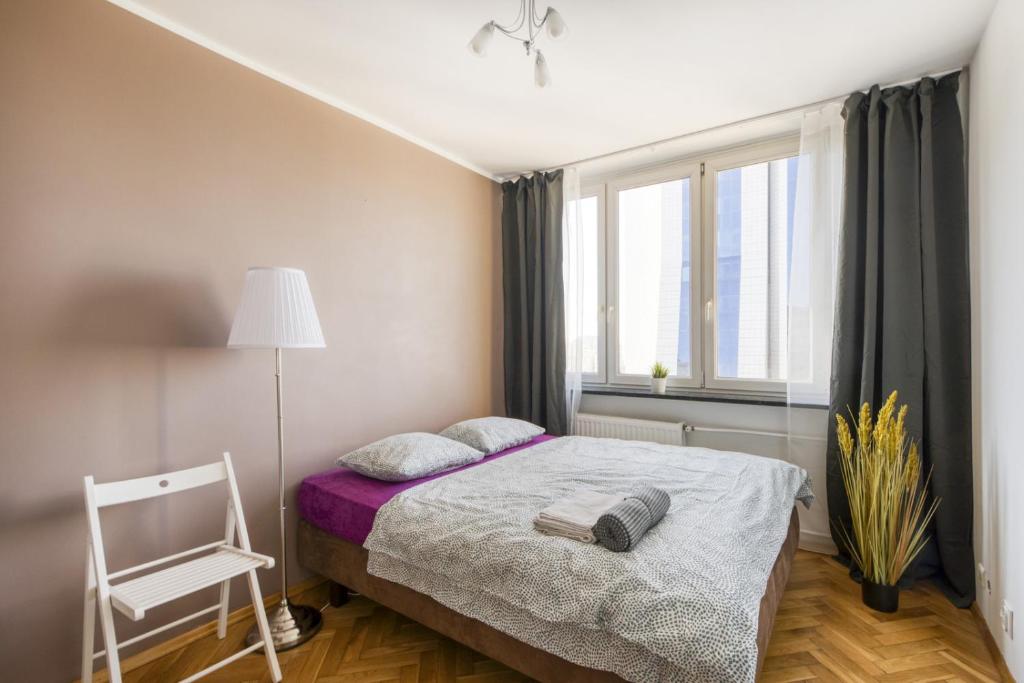 Posteľ alebo postele v izbe v ubytovaní Pańska Residence