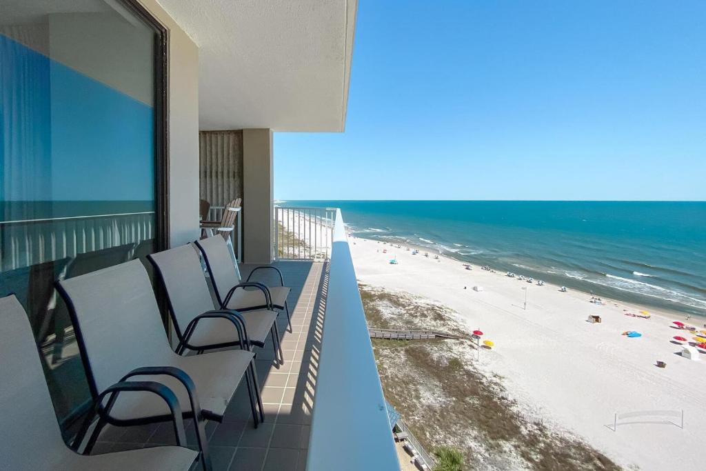 a balcony with a view of the beach at Stunning Views, 3BD/2BA w/ Private Balcony in Orange Beach