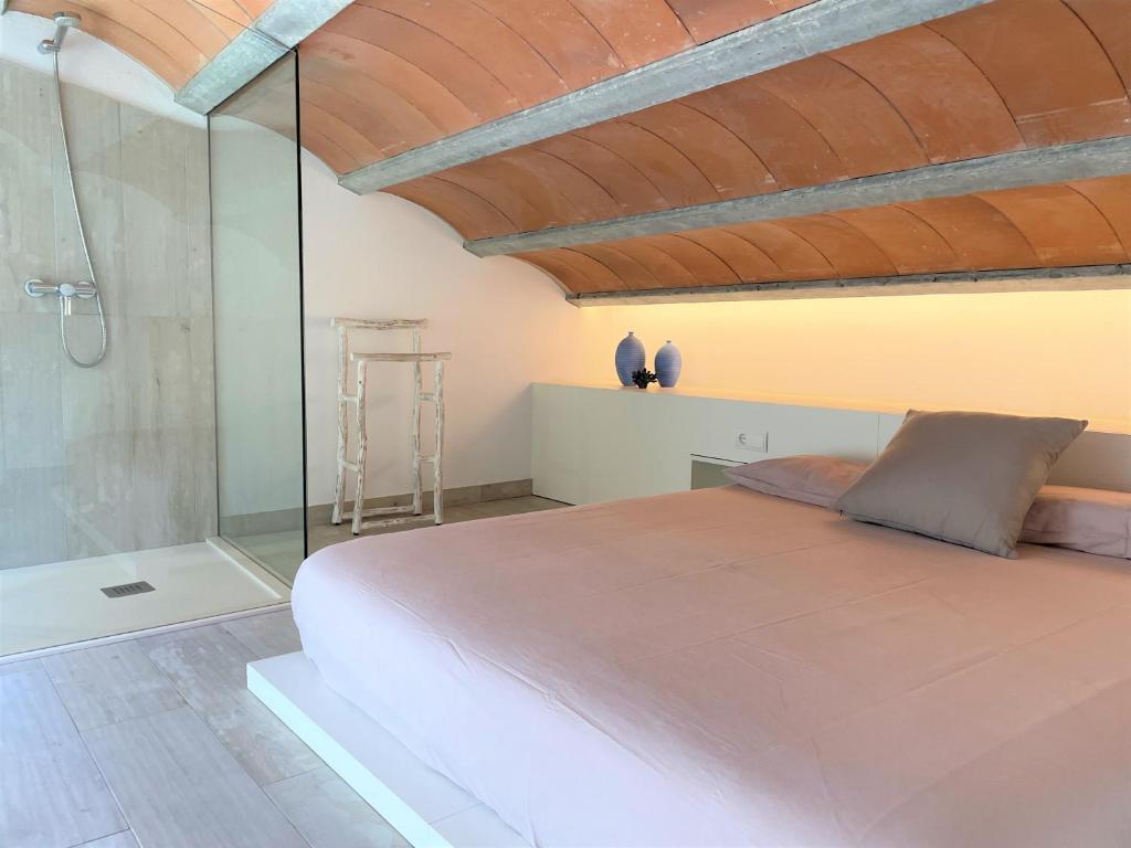 Postel nebo postele na pokoji v ubytování POAL-Dúplex de ensueño en Cadaqués