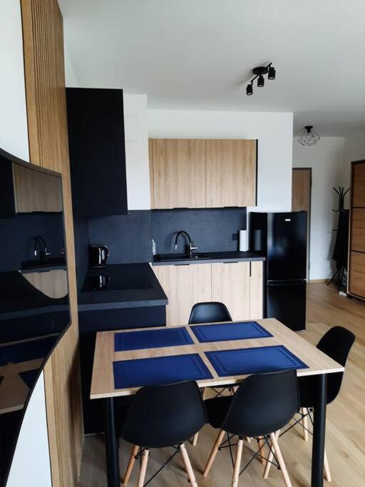Kuchyňa alebo kuchynka v ubytovaní Apartament Przy Plaży Gdańsk