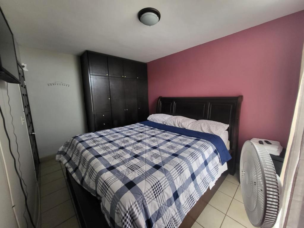 Postel nebo postele na pokoji v ubytování Departamentos Velasco Recamaras