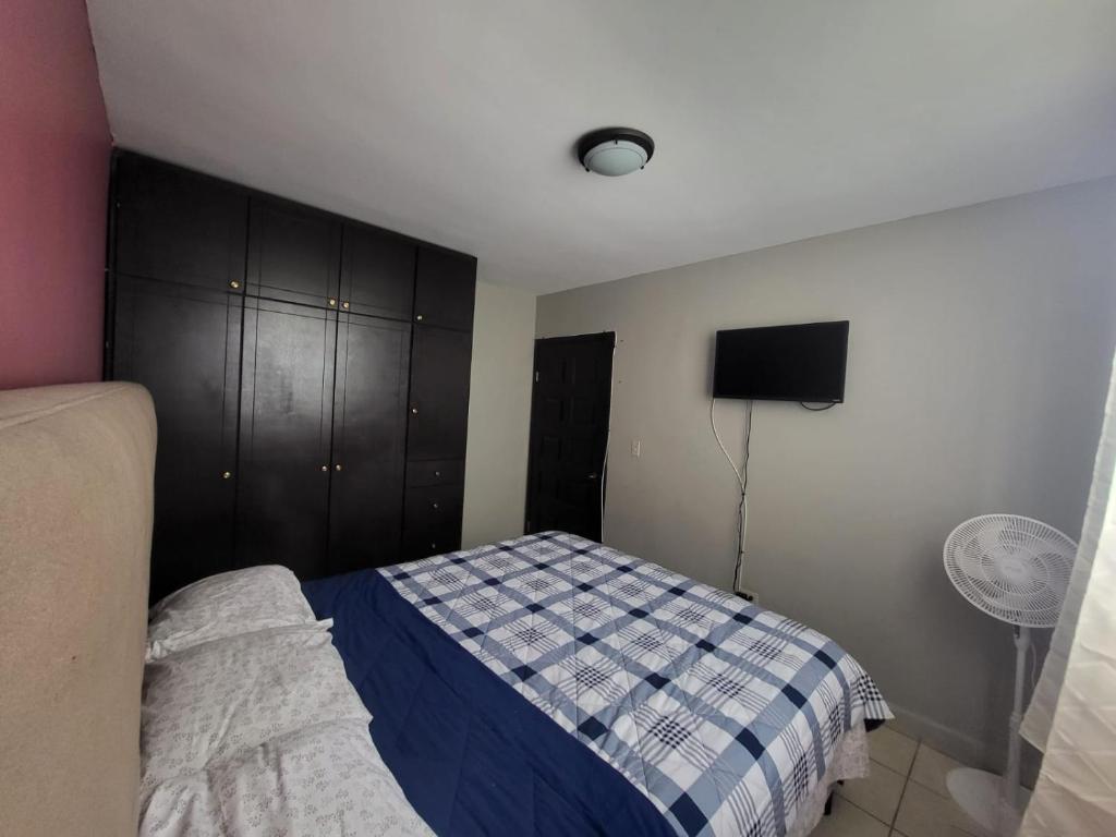 Postel nebo postele na pokoji v ubytování Departamentos Velasco Recamaras