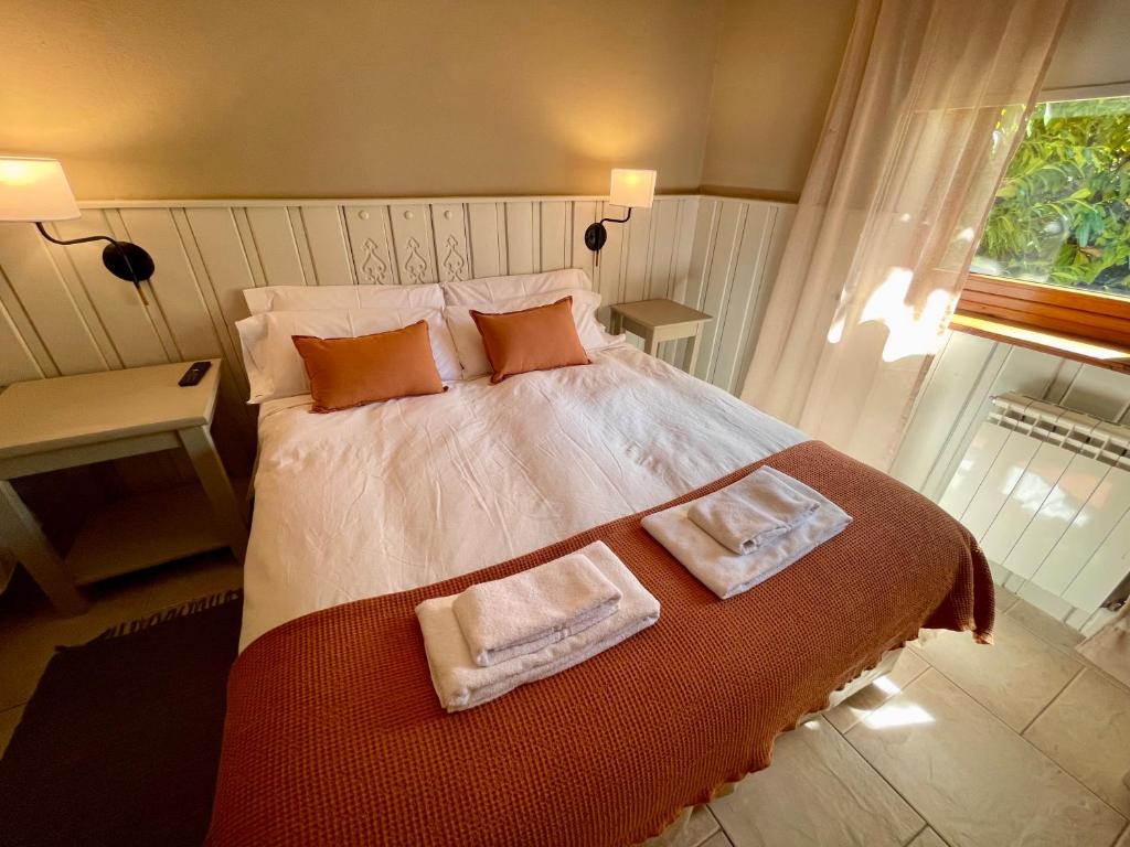 Uma cama ou camas num quarto em Las Marianas Hotel