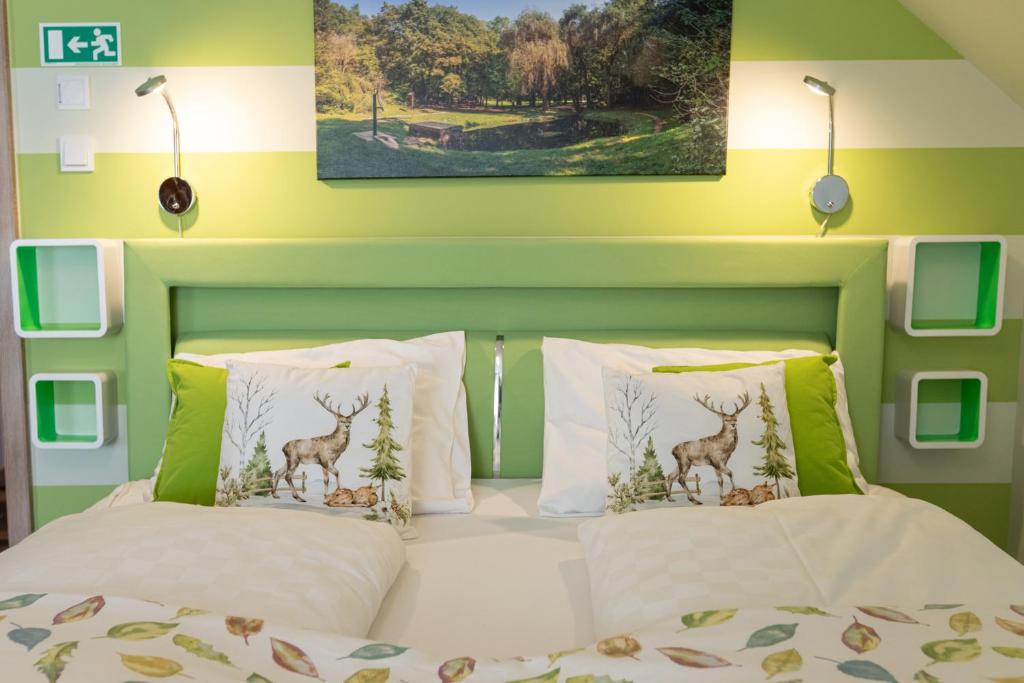 A bed or beds in a room at Balaton Fantasy Villa