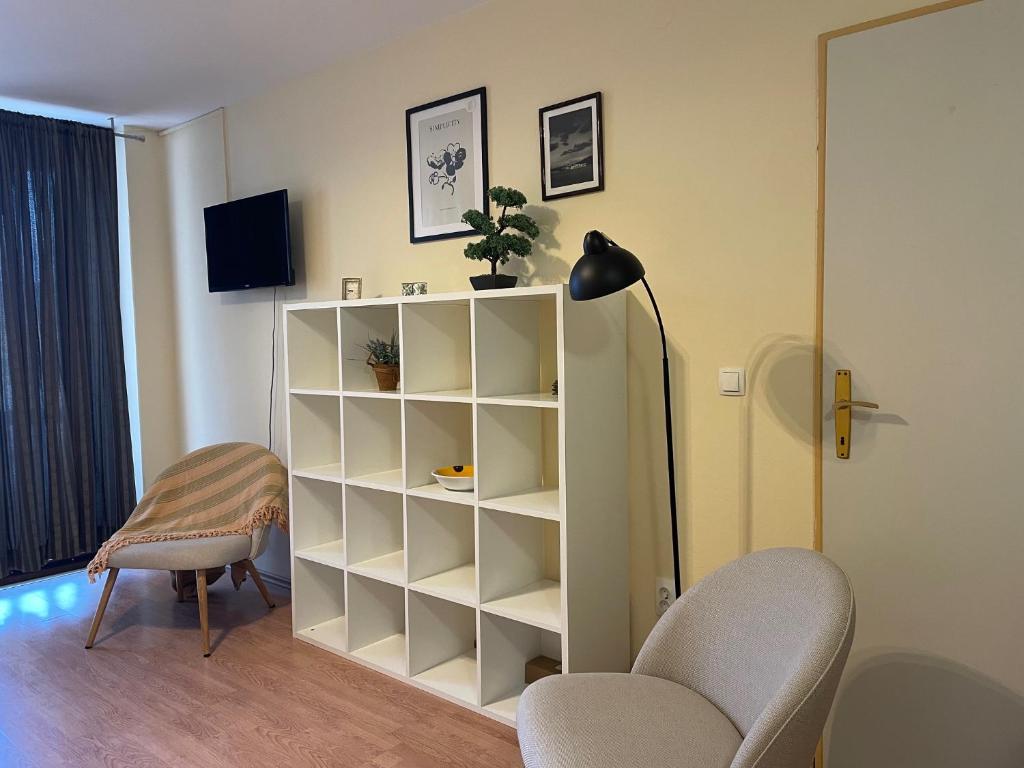 TV a/nebo společenská místnost v ubytování APARTMENTS Ana by the SEA