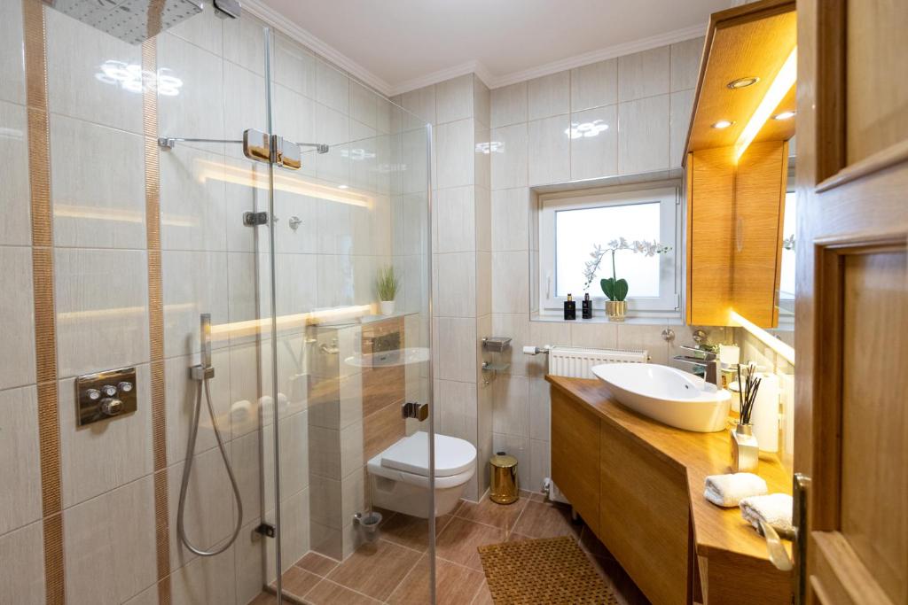 A bathroom at Balaton Fantasy Villa