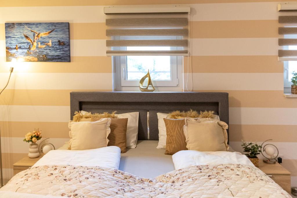 A bed or beds in a room at Balaton Fantasy Villa