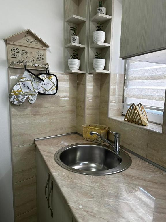 Kuchyň nebo kuchyňský kout v ubytování L&D apartman